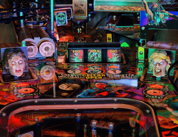 Evil Dead pinball machine, Evil Dead Collector's Edition pinball, Bruce Campbell pinball machine, Limited edition Evil Dead pinball, Spooky Pinball Evil Dead, Horror movie pinball machine, am Raimi Evil Dead pinball, Evil Dead 2 pinball game, Ash Williams pinball machine, Necronomicon pinball feature, Wide-body pinball machine, Motorized pinball toys, Evil Dead vs. other horror pinballs, Collector’s edition pinball cost, Evil Dead pinball machine for sale near me, Pinball expo Evil Dead edition