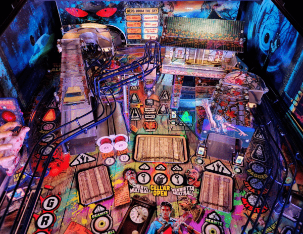 Evil Dead pinball machine, Evil Dead Collector's Edition pinball, Bruce Campbell pinball machine, Limited edition Evil Dead pinball, Spooky Pinball Evil Dead, Horror movie pinball machine, am Raimi Evil Dead pinball, Evil Dead 2 pinball game, Ash Williams pinball machine, Necronomicon pinball feature, Wide-body pinball machine, Motorized pinball toys, Evil Dead vs. other horror pinballs, Collector’s edition pinball cost, Evil Dead pinball machine for sale near me, Pinball expo Evil Dead edition